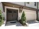 Charming home with a double door entrance, two-car garage, and manicured landscaping at 1821 Huntington Hills Nw Ln, Atlanta, GA 30309