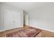 This bedroom showcases hardwood floors, natural light, and closet storage space at 1922 Coal Pl, Atlanta, GA 30318