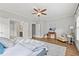 Main bedroom with lots of natural light and a seating area at 1922 Coal Pl, Atlanta, GA 30318