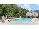 Enjoy the community pool with plenty of lounge chairs and green space at 1922 Coal Pl, Atlanta, GA 30318