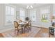 Charming dining area filled with light, featuring elegant seating and an inviting ambiance at 1922 Coal Pl, Atlanta, GA 30318