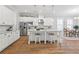 Bright, spacious kitchen with white cabinets, stainless steel appliances, and a center island at 1922 Coal Pl, Atlanta, GA 30318