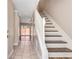 Entryway with hardwood floors and a staircase leading to the upper level at 2306 Queen Anne Ct, Atlanta, GA 30350