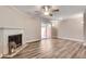 Open living room with fireplace and sliding glass door leading to outdoor space at 2306 Queen Anne Ct, Atlanta, GA 30350