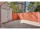 Private outdoor patio area featuring a privacy fence and concrete flooring at 2306 Queen Anne Ct, Atlanta, GA 30350