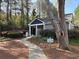 Community pool entrance with well-maintained landscaping and a sign indicating private access at 2306 Queen Anne Ct, Atlanta, GA 30350