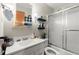 Functional bathroom featuring a shower-tub combo, modern vanity, and updated lighting at 945 Blackwell Rd, Marietta, GA 30066