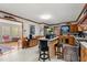 Well-lit kitchen with wooden cabinetry, central island, and breakfast bar at 945 Blackwell Rd, Marietta, GA 30066