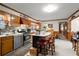 Well-equipped kitchen with stainless steel appliances and a center island with bar stools at 945 Blackwell Rd, Marietta, GA 30066
