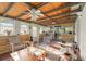 Bright sunroom with ample windows, ceiling fan, and rustic wood accents at 945 Blackwell Rd, Marietta, GA 30066