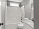 Bathroom with tub, toilet, and vanity with granite countertops at 4248 Brighton Nw Way, Kennesaw, GA 30144