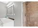 Well-lit bathroom with a shower and a vanity with modern fixtures at 4248 Brighton Nw Way, Kennesaw, GA 30144