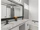 Elegant bathroom with double sinks, granite countertops, and a large mirror at 4248 Brighton Nw Way, Kennesaw, GA 30144