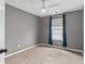Bedroom with a window and ceiling fan with lights at 4248 Brighton Nw Way, Kennesaw, GA 30144