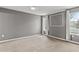 Bright and spacious bedroom with carpet, white trim, and multiple windows at 4248 Brighton Nw Way, Kennesaw, GA 30144