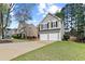 Inviting two-story home with a two-car garage and a well-manicured lawn at 4248 Brighton Nw Way, Kennesaw, GA 30144