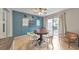 Dining area featuring modern wall paneling and lighting, ideal for entertaining guests at 664 Powers Ferry North Se, Marietta, GA 30067