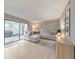 Bright and spacious living room with sliding glass doors leading to a private patio at 664 Powers Ferry North Se, Marietta, GA 30067