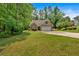 A well-maintained single-Gathering home with a brick facade and two-car garage sits on a spacious lot at 8166 N Pine Cone Dr, Villa Rica, GA 30180