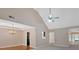 Open living room and dining area with vaulted ceiling at 8166 N Pine Cone Dr, Villa Rica, GA 30180