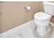 Close-up of a toilet in a clean and well maintained bathroom at 8166 N Pine Cone Dr, Villa Rica, GA 30180