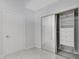 Bedroom walk-in closet with shelving, drawers, and hanging rods for optimal organization at 855 Peachtree Ne St # 2812, Atlanta, GA 30308