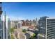 Balcony view capturing the city's skyline with various commercial buildings at 855 Peachtree Ne St # 2812, Atlanta, GA 30308