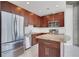 Elegant kitchen featuring stainless steel appliances, granite countertops, and abundant cabinet space at 855 Peachtree Ne St # 2812, Atlanta, GA 30308