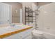 Neutral bathroom featuring a vanity, toilet and shower and tub combo at 241 Rose Ridge Dr, Canton, GA 30115