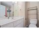 Cozy bathroom features a single sink vanity, classic fixtures, and a shower-tub combination at 241 Rose Ridge Dr, Canton, GA 30115