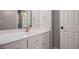 Clean bathroom with a white marble countertop, drawers and cabinets at 241 Rose Ridge Dr, Canton, GA 30115