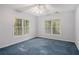 Spacious bedroom with two large windows providing natural light at 241 Rose Ridge Dr, Canton, GA 30115