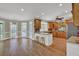 Charming eat-in kitchen features a breakfast bar, granite countertops, stainless steel appliances, and abundant natural light at 241 Rose Ridge Dr, Canton, GA 30115