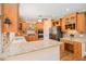 Updated kitchen featuring granite counters, stainless appliances, and an island with seating at 241 Rose Ridge Dr, Canton, GA 30115