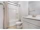 Well-lit bathroom features a shower-tub combo and a modern vanity at 400 Paulownia Cir, Mcdonough, GA 30253