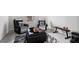 Cozy bonus room with themed chairs, ottoman, and sports decor, perfect for relaxation at 400 Paulownia Cir, Mcdonough, GA 30253