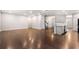 Expansive open-concept living room featuring hardwood floors and ample natural light at 400 Paulownia Cir, Mcdonough, GA 30253