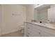 Bathroom with marble countertops and a modern vanity at 8020 Woodland Ln, Alpharetta, GA 30009