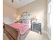 Bedroom featuring neutral color scheme, a plush bed, and tasteful decor, offering a restful environment at 1438 Kings Park Nw Dr, Kennesaw, GA 30152