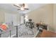 Comfortable bedroom featuring a daybed, ceiling fan, and double door closet at 1438 Kings Park Nw Dr, Kennesaw, GA 30152