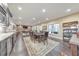 Spacious game room with a wet bar, card table, pool table, and ample seating at 1438 Kings Park Nw Dr, Kennesaw, GA 30152