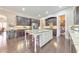 Well-equipped kitchen featuring a spacious island, stainless steel appliances, and hardwood floors at 1438 Kings Park Nw Dr, Kennesaw, GA 30152
