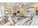 Inviting living room featuring coffered ceilings, a fireplace, and neutral decor, perfect for relaxing and entertaining at 1438 Kings Park Nw Dr, Kennesaw, GA 30152