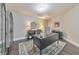 Well-lit office with a modern desk, stylish decor, and hardwood floors at 1438 Kings Park Nw Dr, Kennesaw, GA 30152