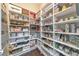 Walk-in pantry with custom built-in shelving, and well organized storage solutions at 1438 Kings Park Nw Dr, Kennesaw, GA 30152