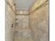 Elegant tiled shower with built-in bench and sleek fixtures at 1438 Kings Park Nw Dr, Kennesaw, GA 30152