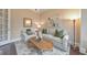Comfortable sitting room with soft lighting, plush seating, and stylish decor elements at 1438 Kings Park Nw Dr, Kennesaw, GA 30152
