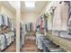 Walk-in closet with ample shelving and hanging space for organized storage at 1438 Kings Park Nw Dr, Kennesaw, GA 30152