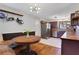 Open-concept kitchen and dining area with stainless steel appliances and hardwood floors at 3650 Dogwood Farm Rd, Decatur, GA 30034