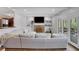 Cozy living room with exposed ceiling beams, fireplace, and built-in shelving at 3650 Dogwood Farm Rd, Decatur, GA 30034